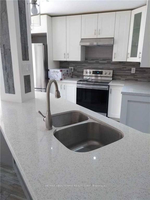 Beautiful, bright, and spacious end unit townhouse in the sought after Westmount community.