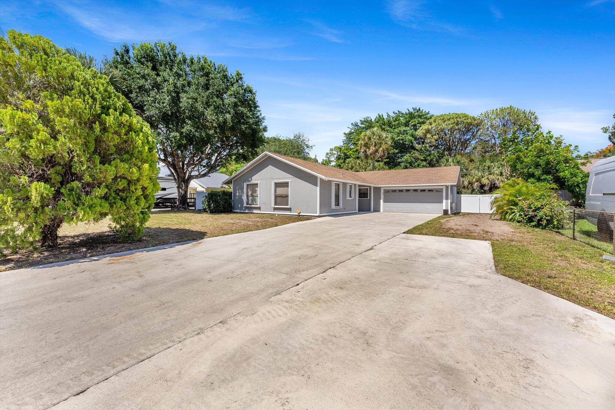 Welcome to this beautifully updated and secluded single family home, offering three bedrooms and two bathrooms, thoughtfully situated on over a quarter acre lot with serene lake views and ample ...