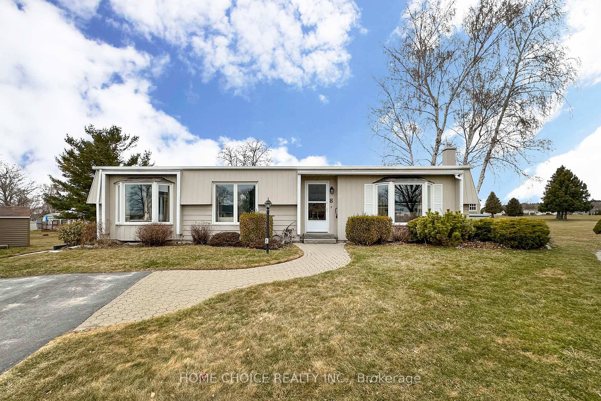 Charming Bungalow on the 7th Hole at Wilmot Creek Adult Lifestyle Community.