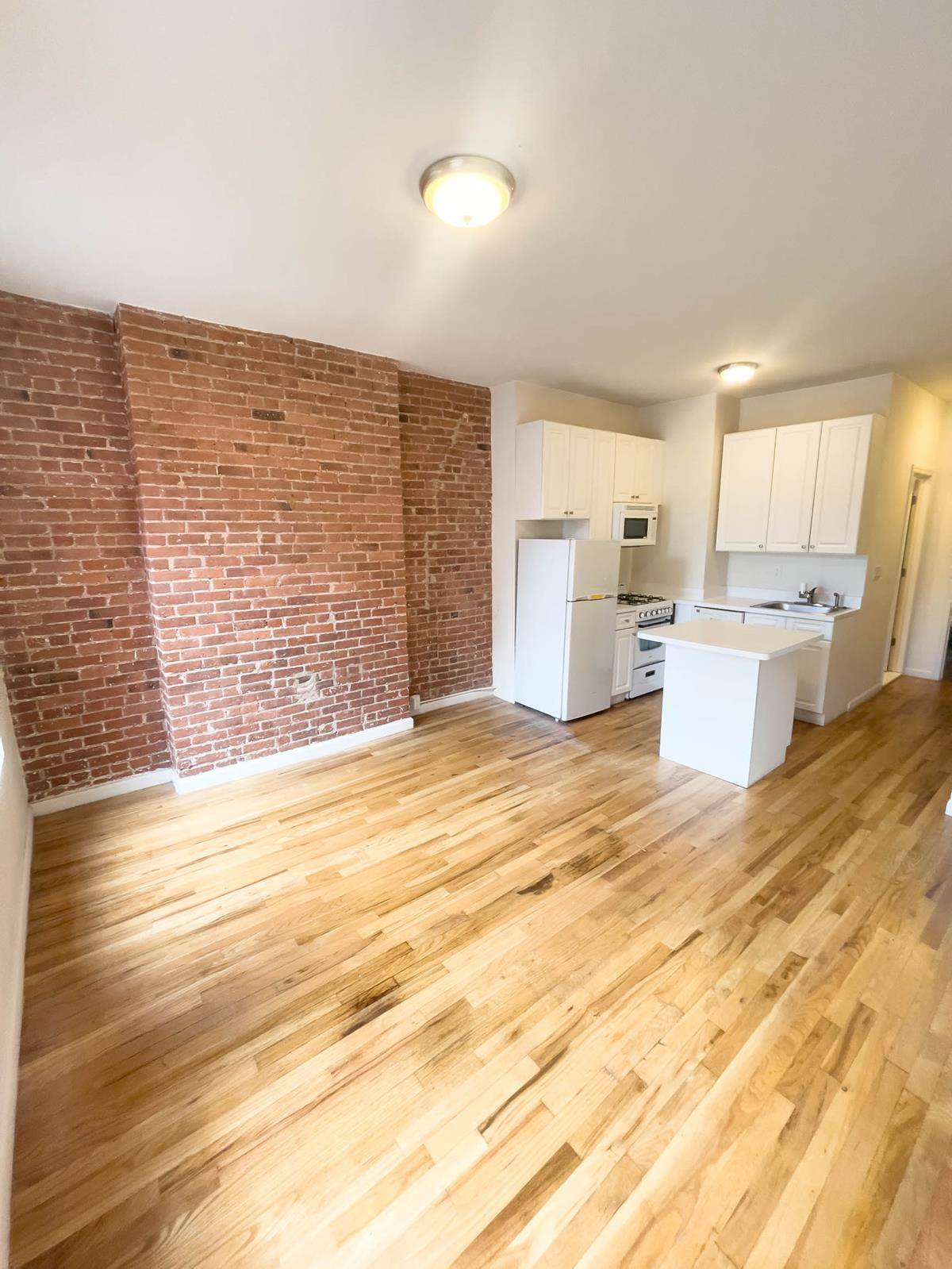 Renovated 1Br in Historic West Village with great light, hardwood floors, high ceilings, exposed brick.