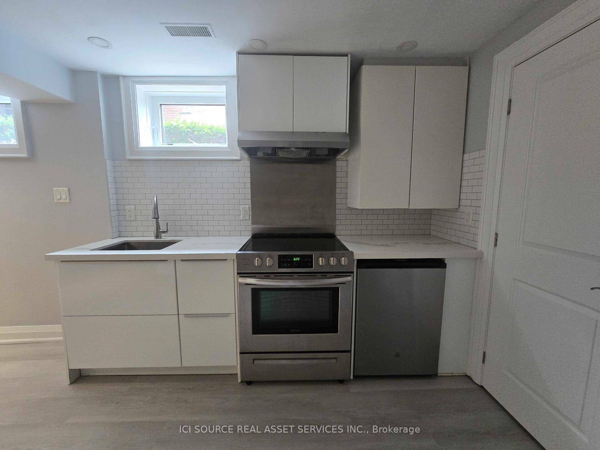 Renovated 1, 127 sqft 2 bedroom, 1 bathroom basement unit of a detached duplex.