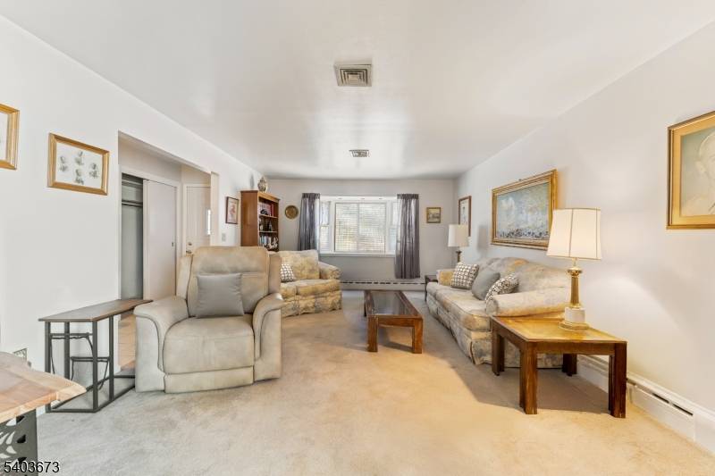 Tucked away on a peaceful cul de sac, this expanded 3 bedroom, 2 bath ranch sits on over one of the area's most private and established neighborhoods.