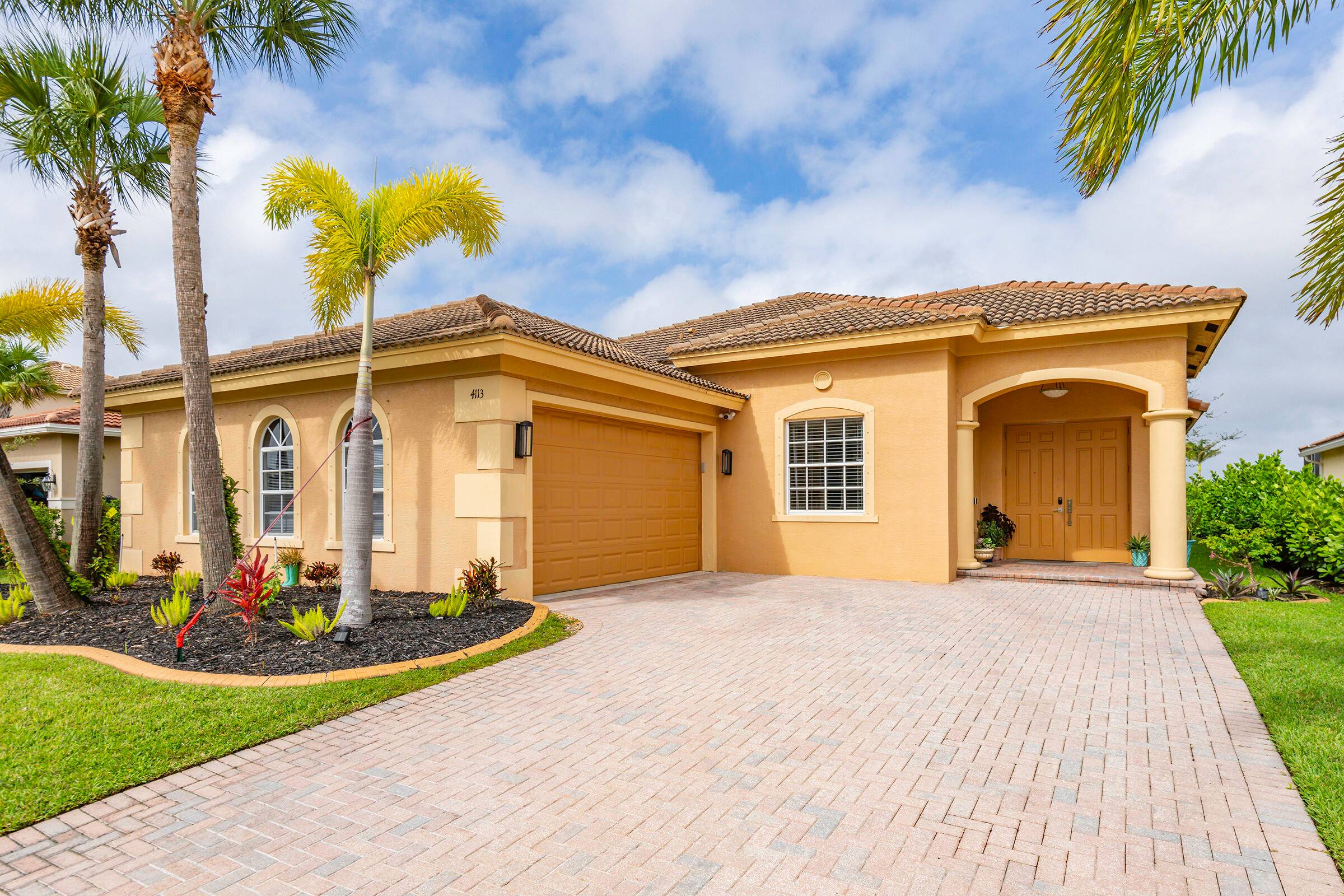 Luxury waterfront living awaits in this fully upgraded 4 bedroom, 3 bath smart home in a gated community.