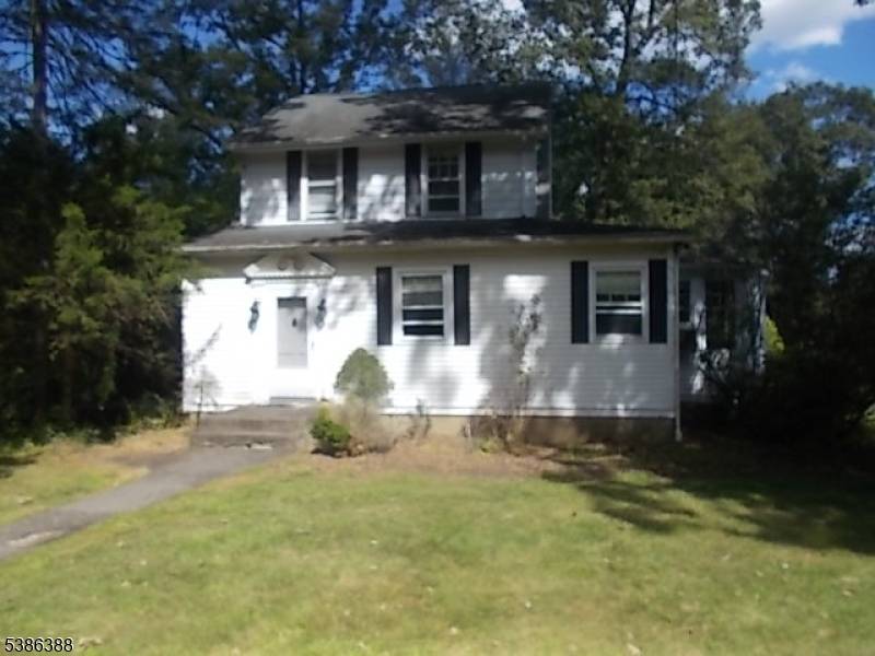LOVELY COLONIAL WITH LOTS OLD WORLD CHARM ON A NICE SIZE LOT.