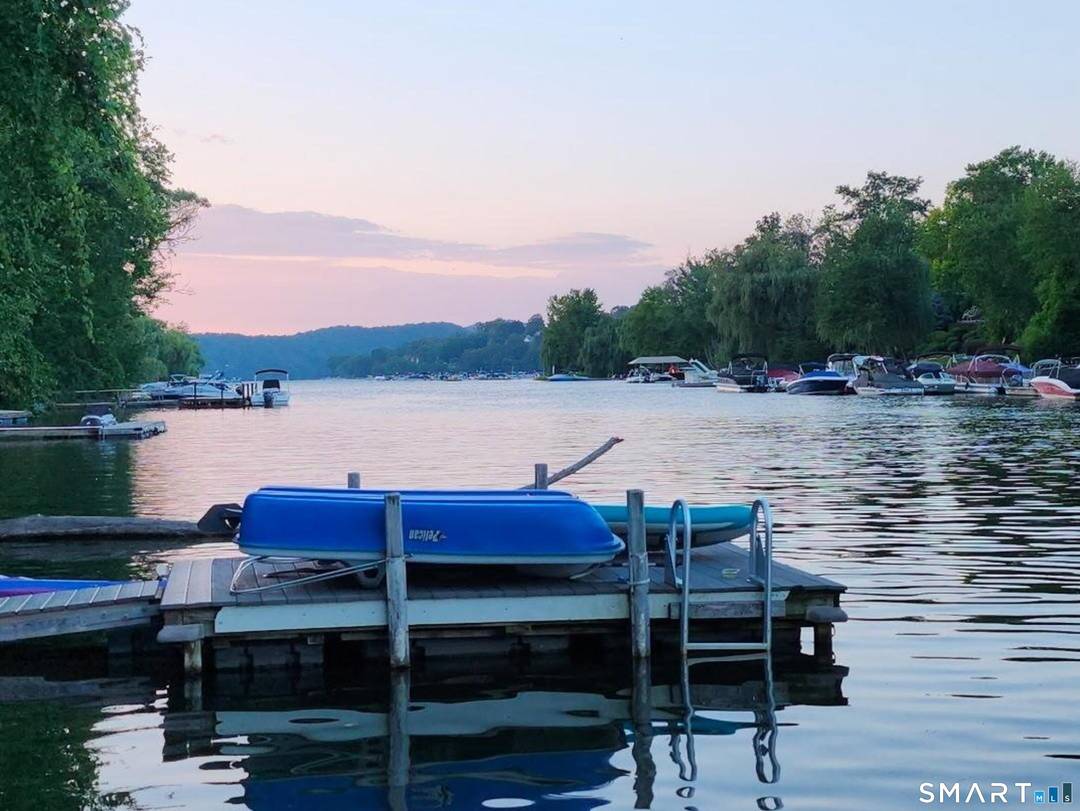 Experience premier Candlewood Lake living in this family friendly 3 level waterfront home.