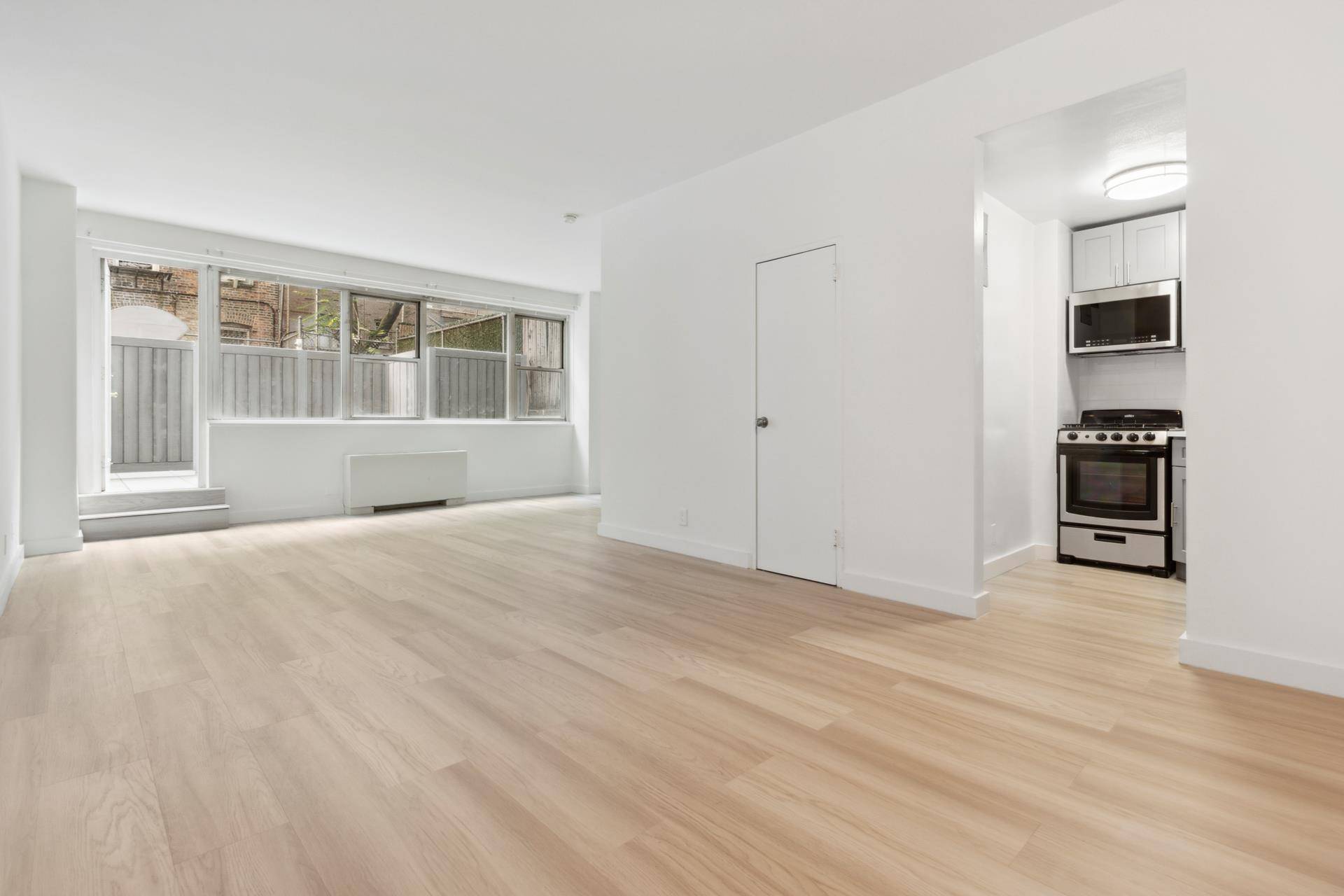 Sponsor Rental NO BOARD APPROVAL1C is a spacious alcove studio with a large private patio.