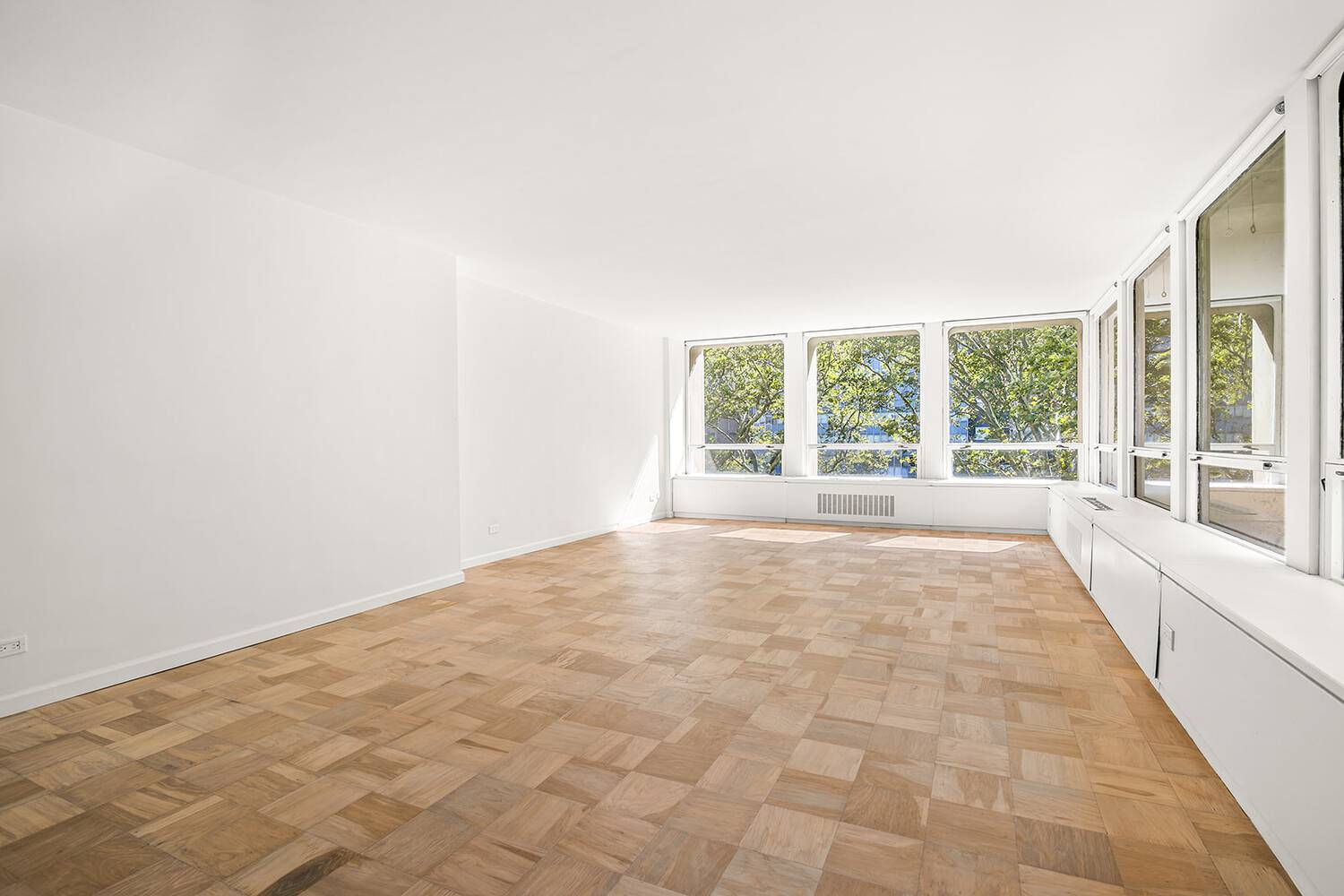 Sundrenched, Spacious, and Rarely Available Corner Unit Welcome to your new home !