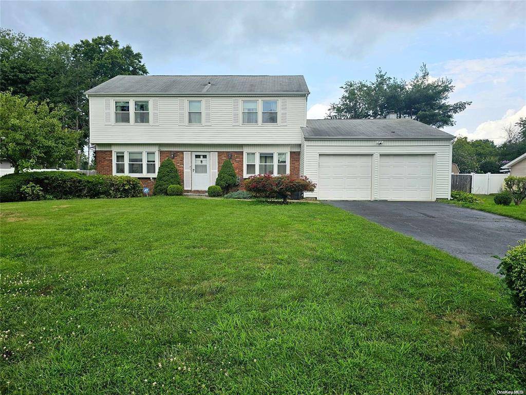 Welcome to this charming colonial home located in the desirable M section of Stony Brook.