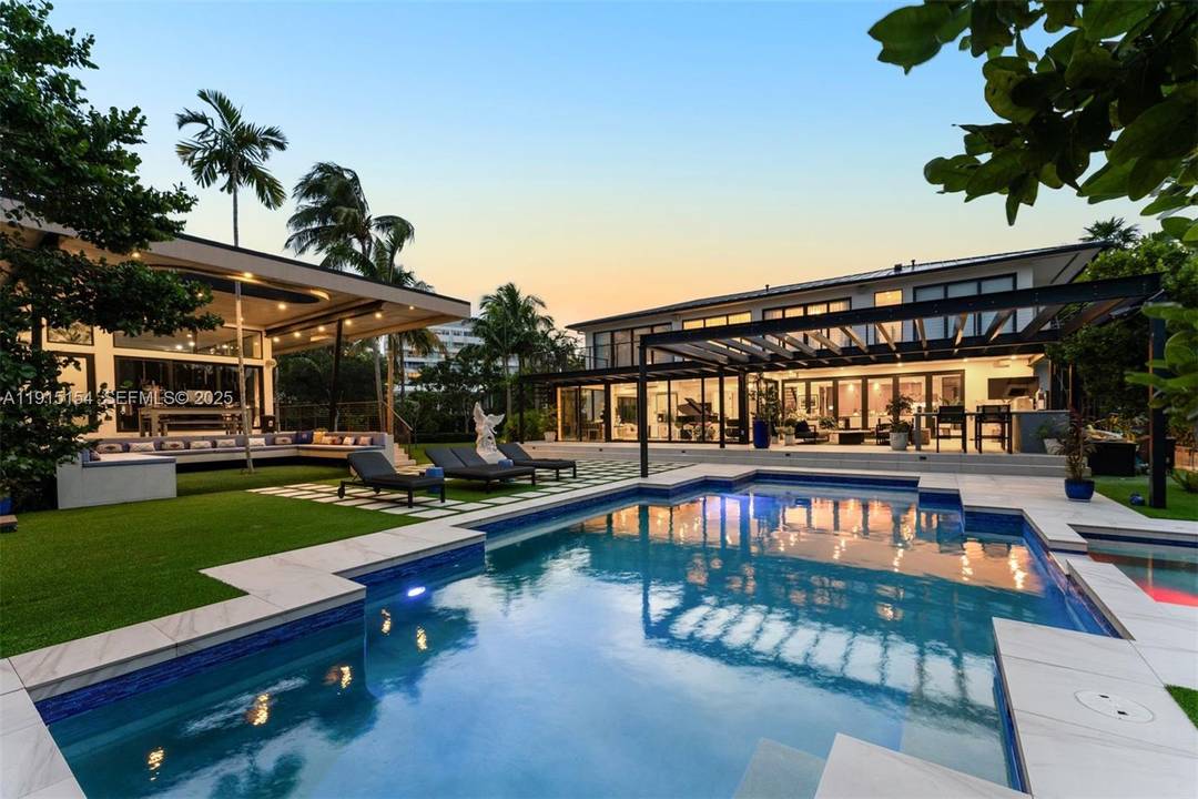 Set on a rare 17, 200 SF double lot in Miami Beach s coveted Lakeview neighborhood, this 2022 custom residence is a modern sanctuary of scale, design, and privacy.