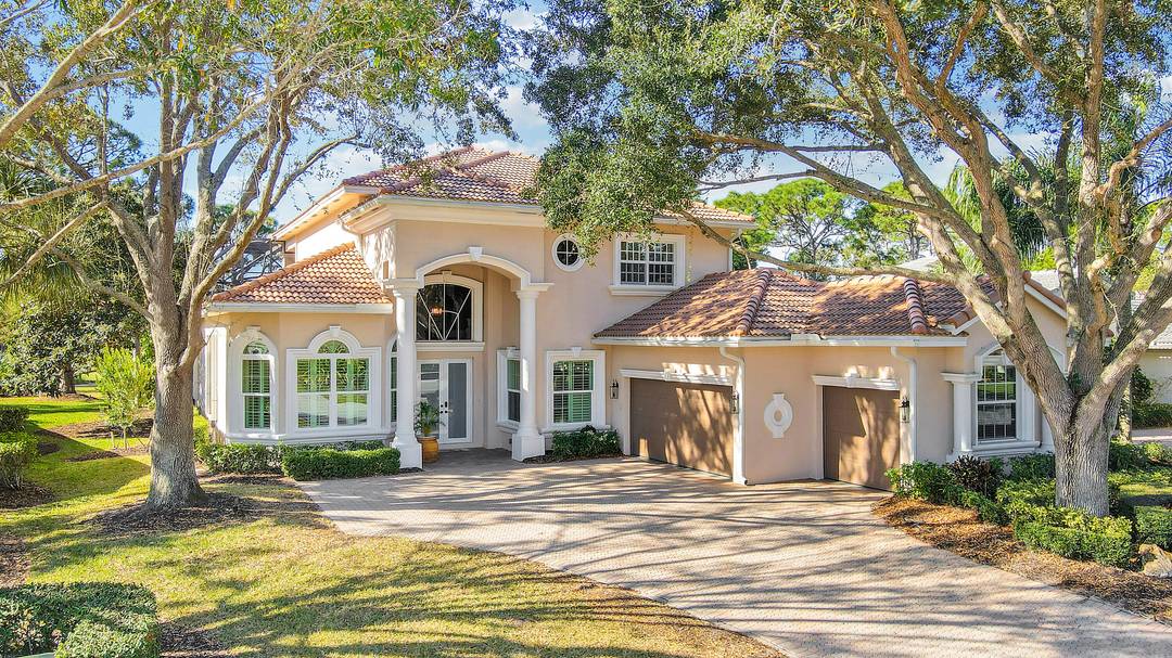 Welcome to 10109 Spyglass Lane, perfectly positioned on the 11th fairway of the Ryder Course in the prestigious PGA Village.
