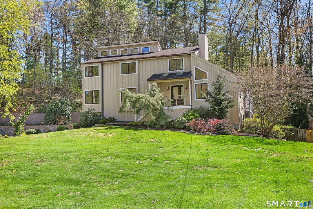 Welcome to this stylish contemporary home with deeded access to Pine Wood Lake, offering the perfect blend of modern open concept living and a vibrant beach and lake community all ...