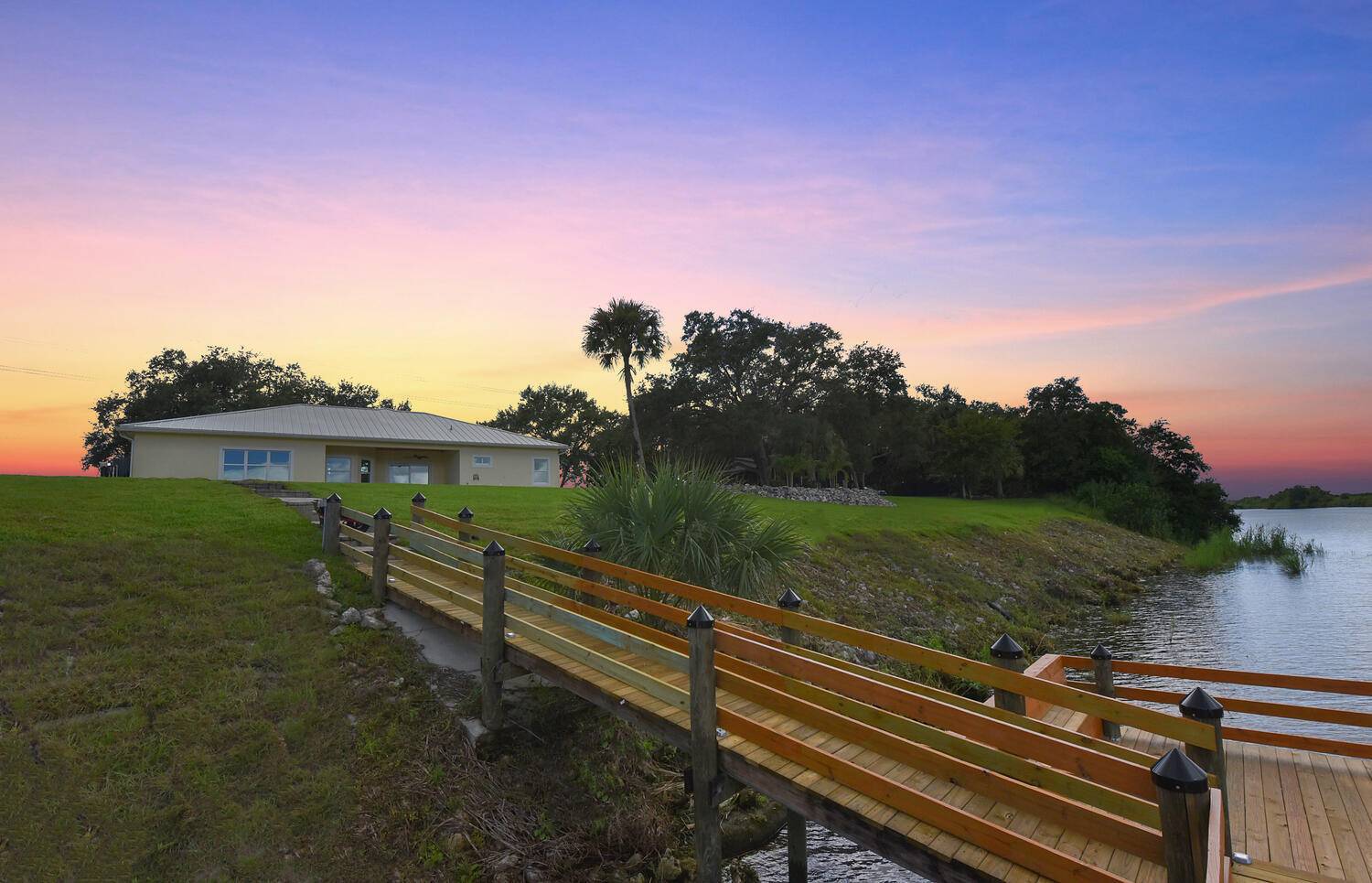 Welcome to River Oaks an extraordinary opportunity to own a meticulously crafted, barely lived in 2024 estate on the tranquil shores of the St.