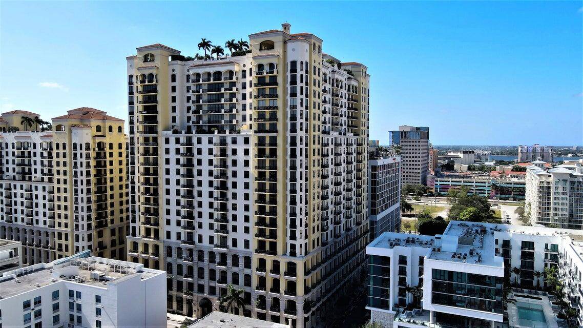 Welcome to Unit 202 at Two City Plaza, Downtown West Palm Beach's Premier Luxury Residence with resort style amenities including roof top pool and fitness center, theater room, valet parking, ...