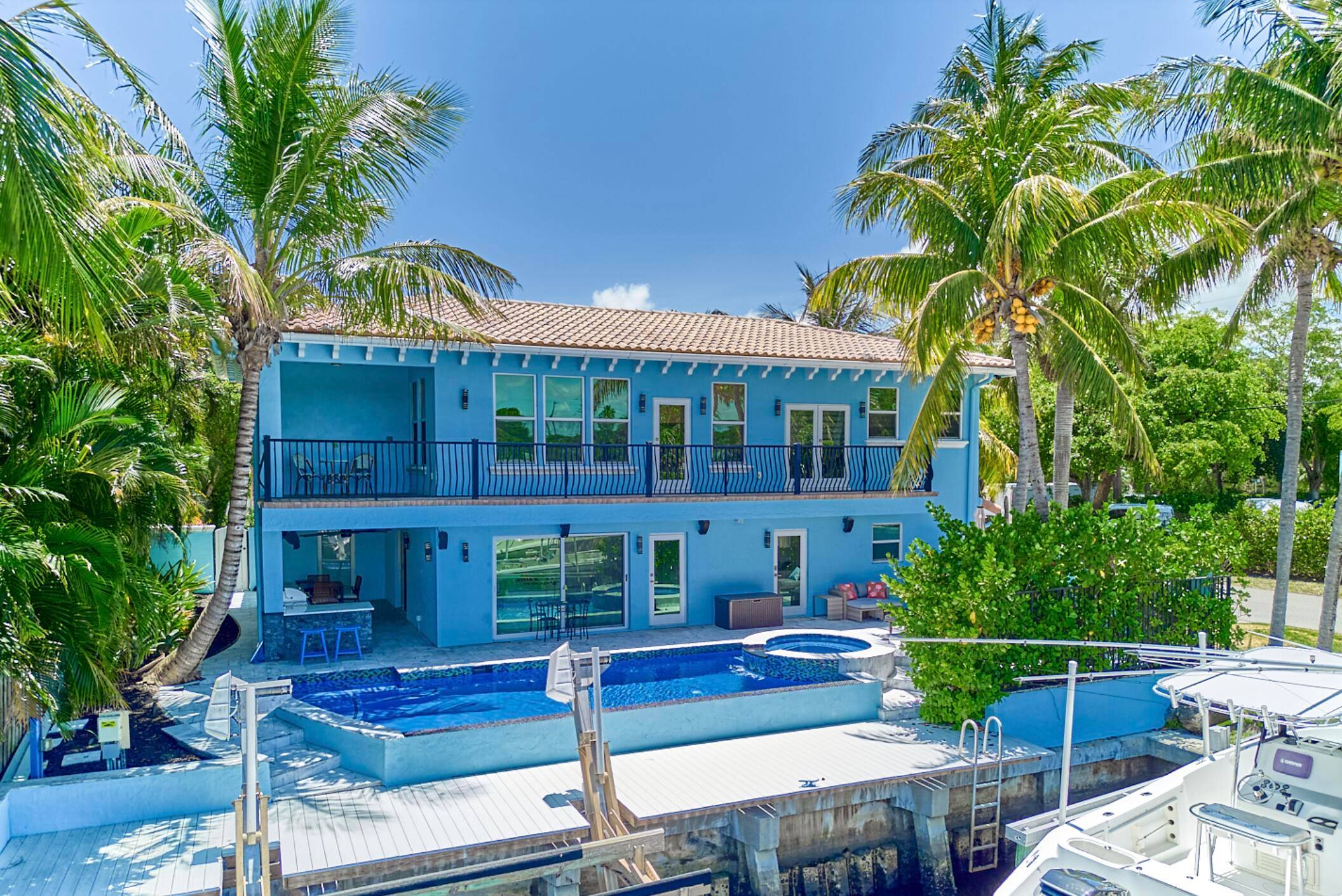 Experience the ultimate Florida getaway in this beautifully appointed five bedroom, five bath short term rental, ideally located just minutes from two of South Florida's most desirable destinations Delray Beach ...