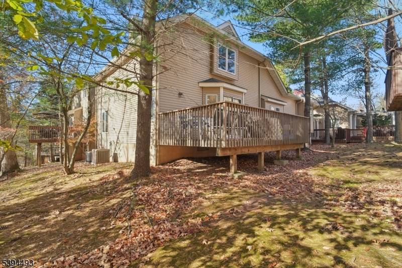 Flooded with NATURAL LIGHT this RARE 3 BR, 2 1 2 Bath Multi Level END Unit BOASTS Approx 3200 sq ft Including FULL FINISHED BASEMENT.