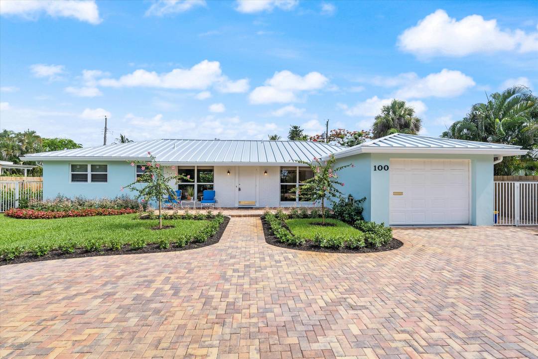 This lovely Delray Beach ranch home is the epitome of Florida living.