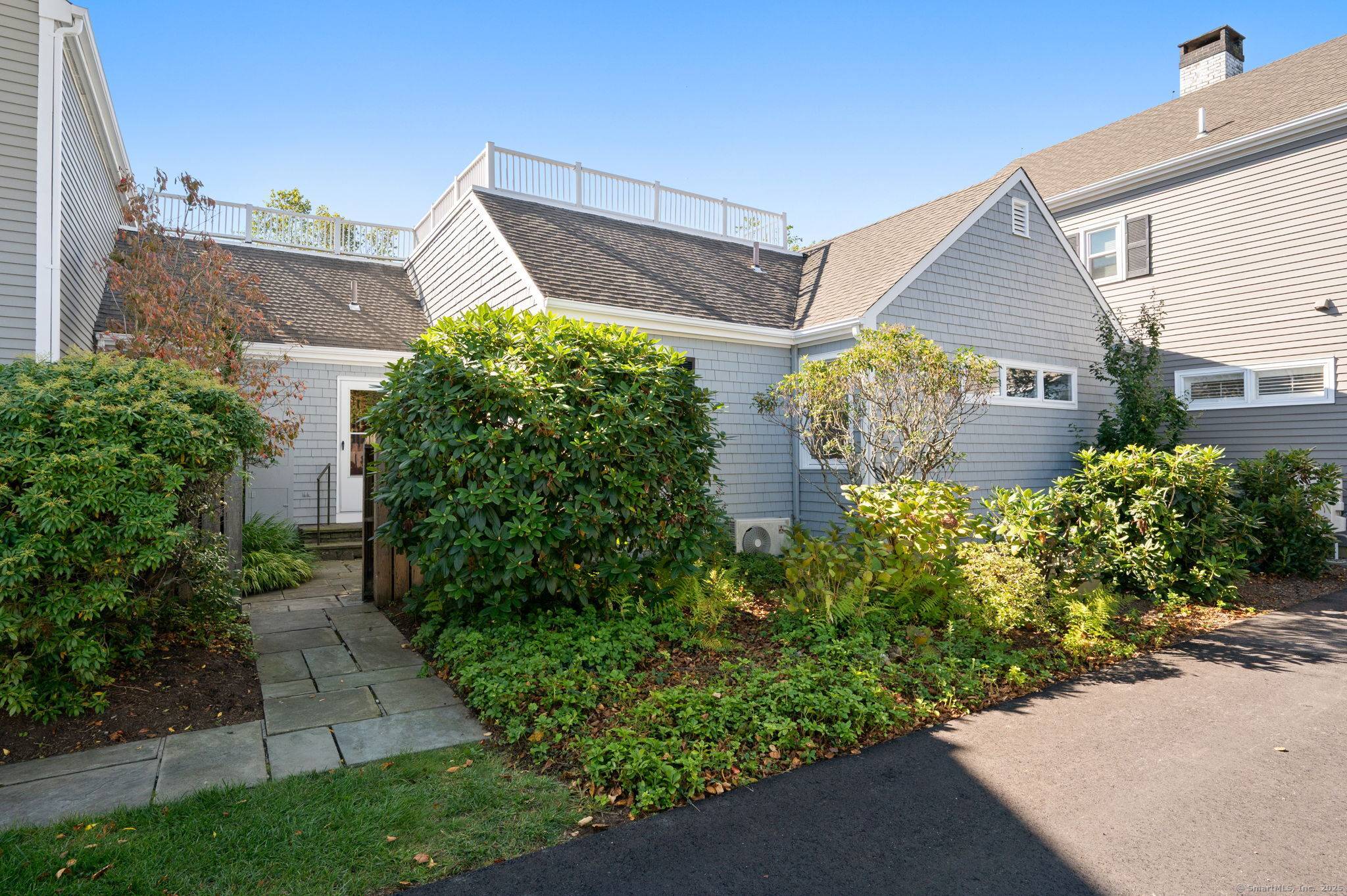 This quaint Ranch style condo sits proudly overlooking Quanaduck Pond.