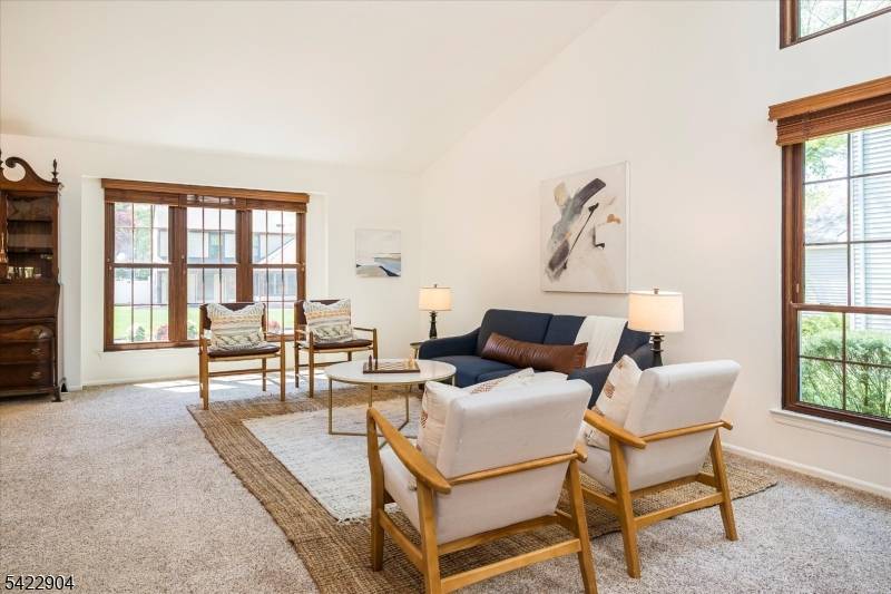 Immaculate 3 bedroom ranch ideally situated on a cul de sac with lush trees behind the home, offering privacy and peaceful views.