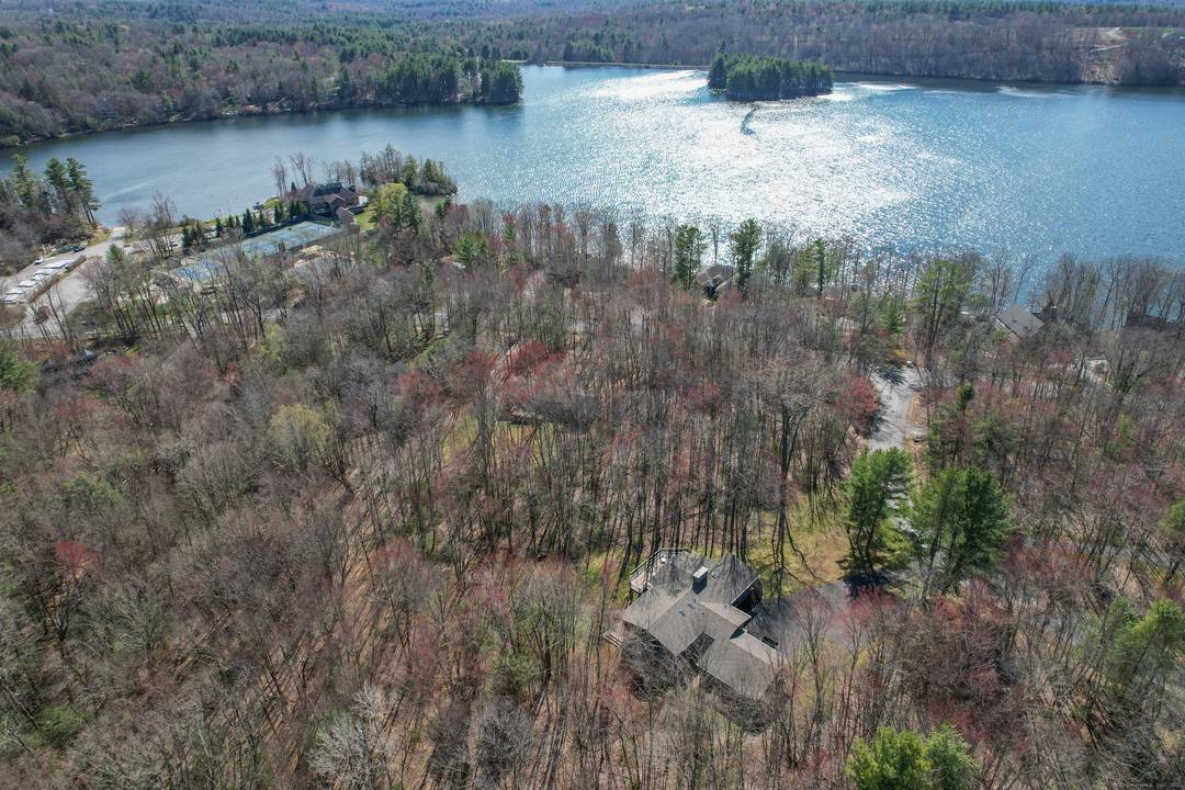 Nestled in the serene community of Woodridge Lake, 187 Sherbrook Drive offers a perfect blend of tranquility and modern living.