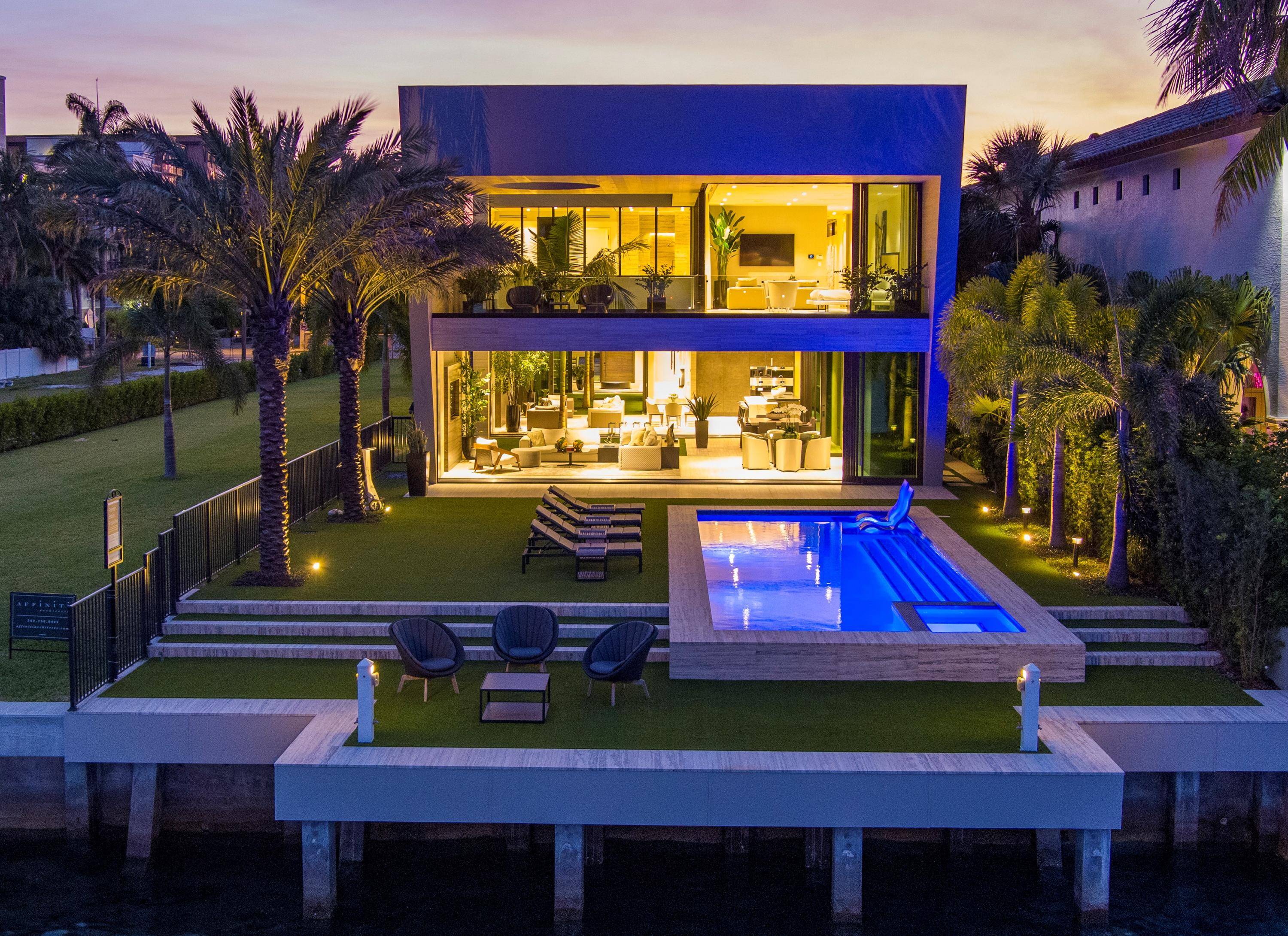New Tour De Force Modern Intracoastal Estate on Fifth Avenue's ''Mansion Row'' of Boca Raton's most prestigious stretch of Intracoastal Estates by National Custom Homes and award winning Affiniti Architects.