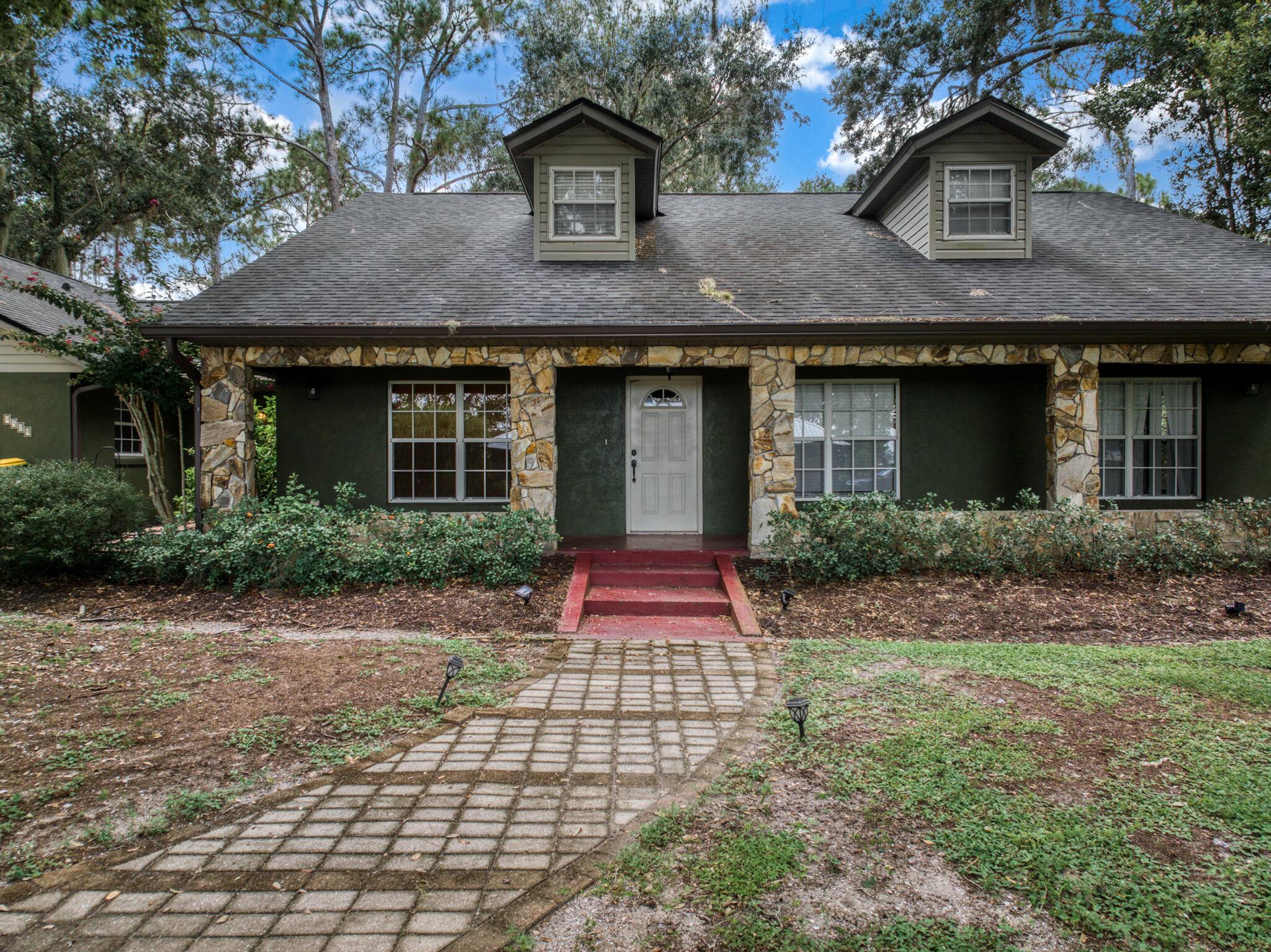 Nestled within beautiful Florida Oaks and walking distance to Lake Josephine, sits this beautiful home !