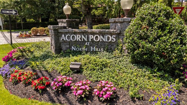 Resort style living awaits at 60 Pheasant Run, a desirable end unit townhome nestled within the sought after Acorn Ponds community.