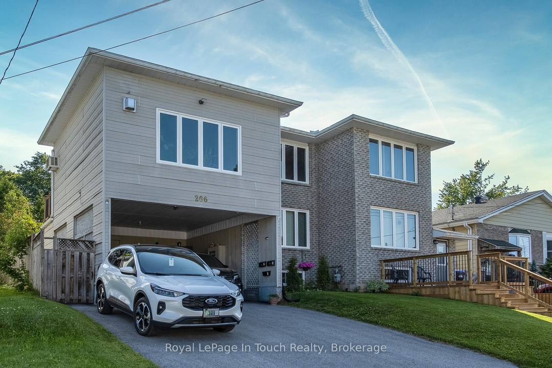 Unique duplex property with a bonus basement studio unit, each with separate entrances.