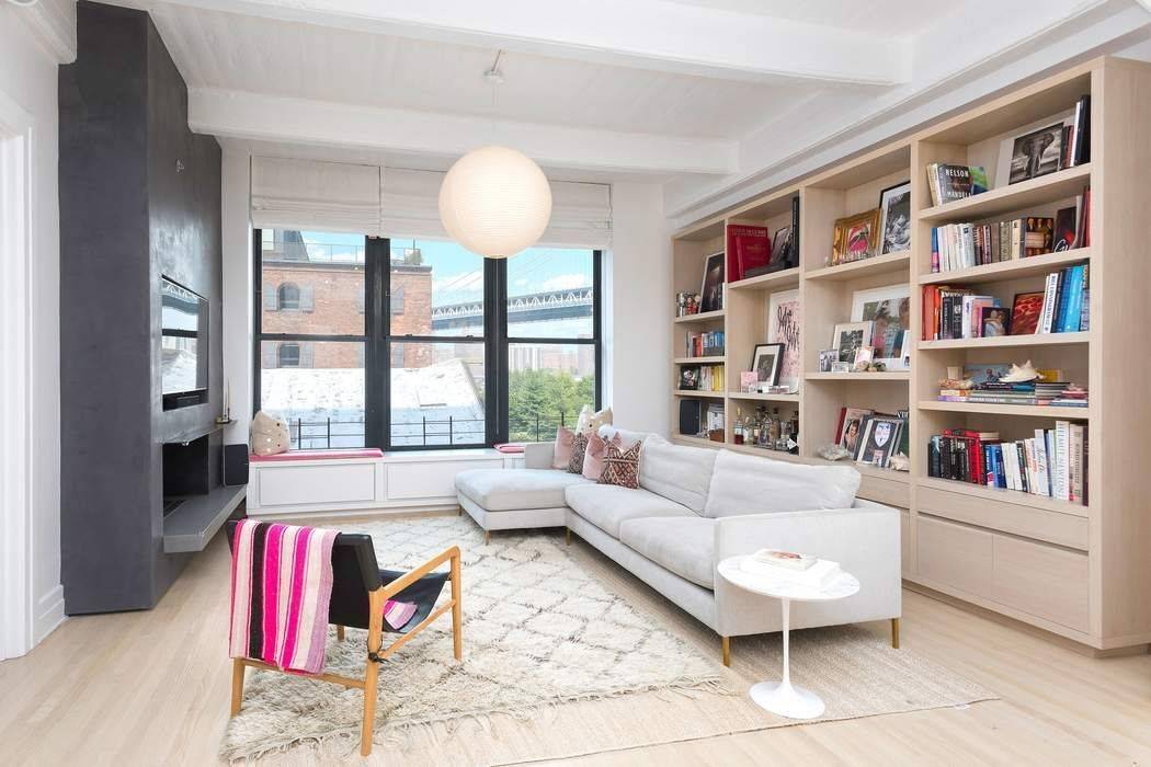 This renovated 1, 515 square foot one bedroom plus home office two full bath loft with 11 foot concrete beamed ceilings in the Sweeney Building in the heart of DUMBO, ...