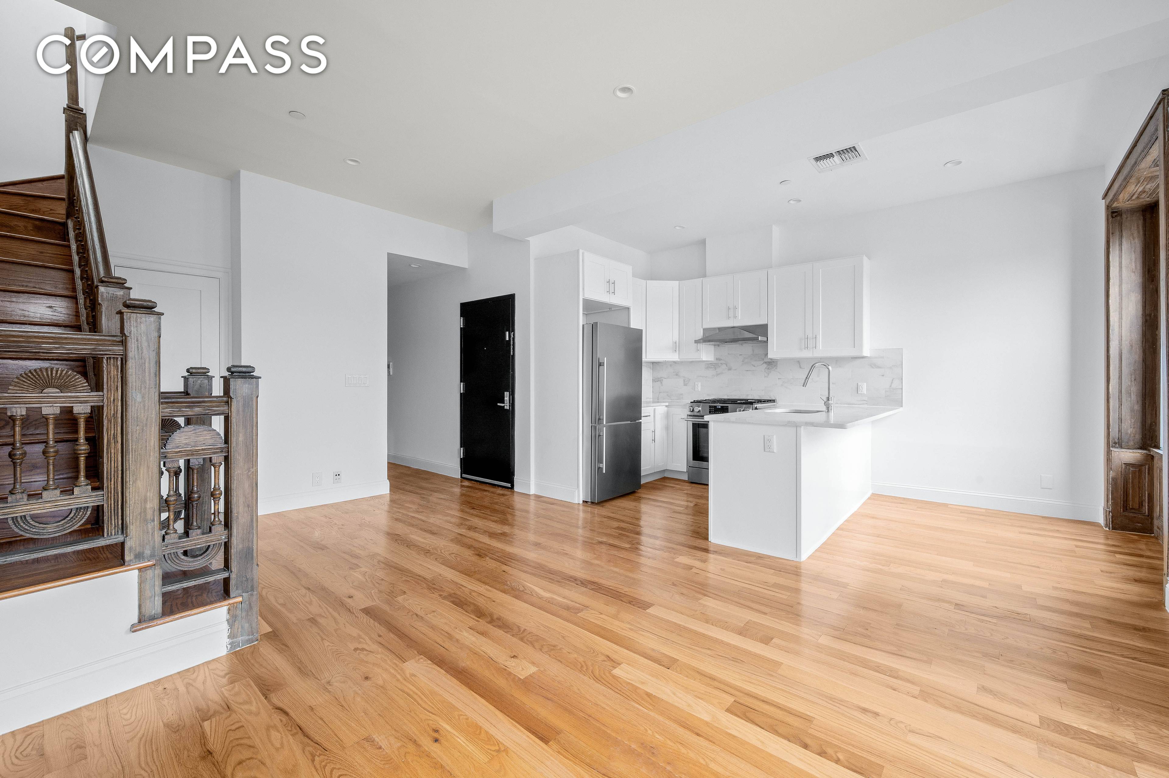 Welcome to 257 Throop Ave, a charming condo nestled within a classic Brooklyn limestone.