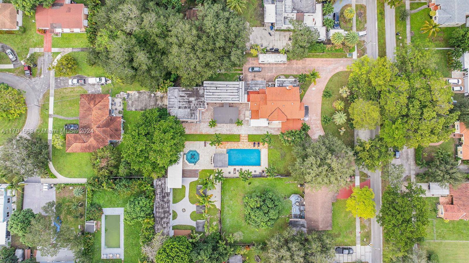 Completely renovated 12 bedroom, 9 bath compound on a double lot, designed for contemporary living.