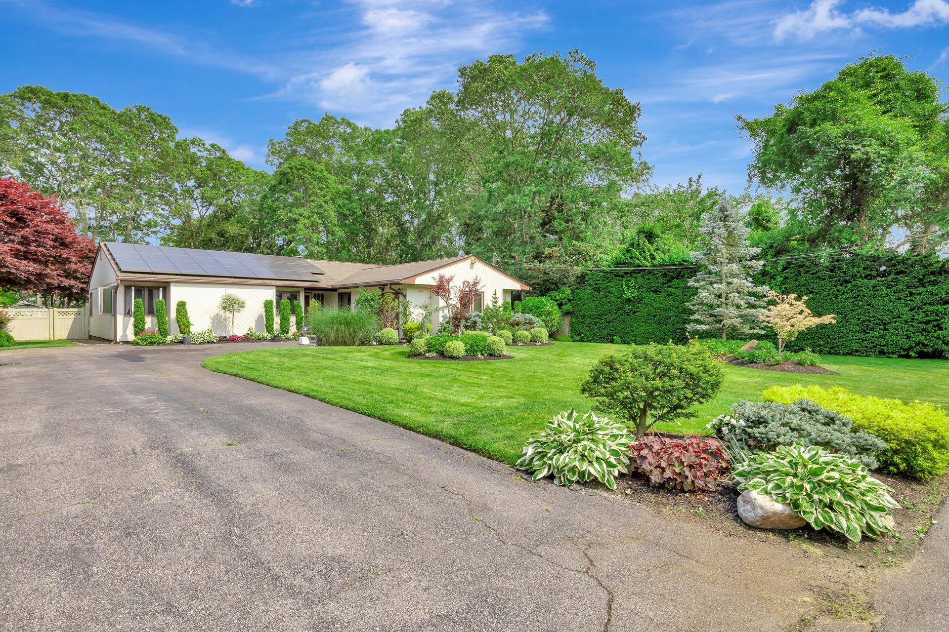 Welcome to this beautifully maintained 3 bedroom, 2 bathroom ranch style home, perfectly set on a spacious.