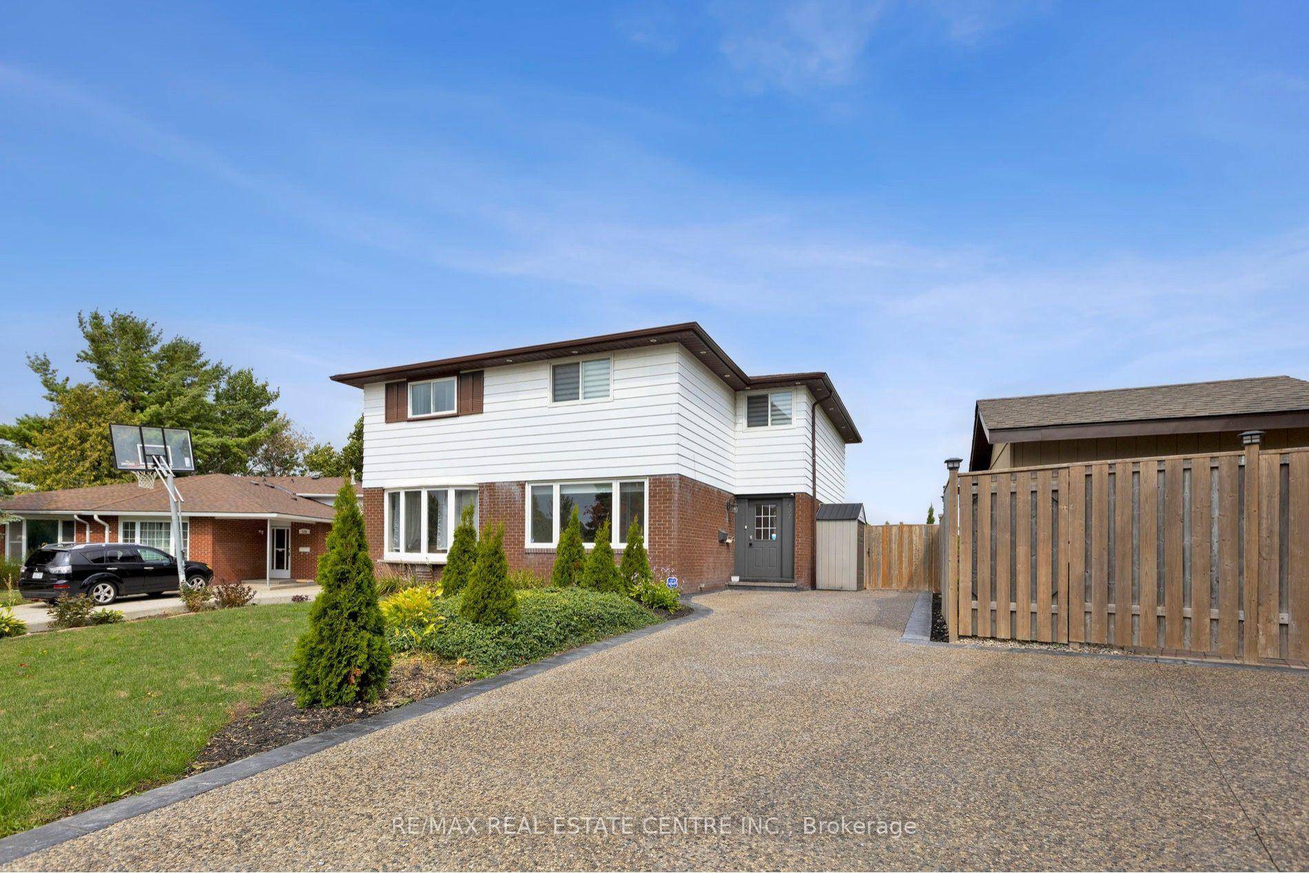 Welcome to 122 Mooregate Crescent, a fully renovated 4 1 bedroom semi detached home with a walk out basement.