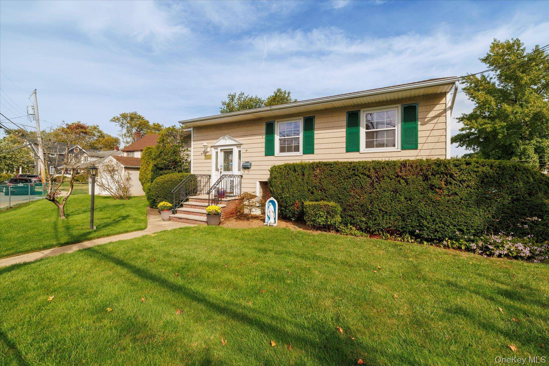 Welcome to this charming, raised ranch nestled on a generous corner lot of approximately 6, 000square feet, this home offers ample outdoor space and great curb appeal.