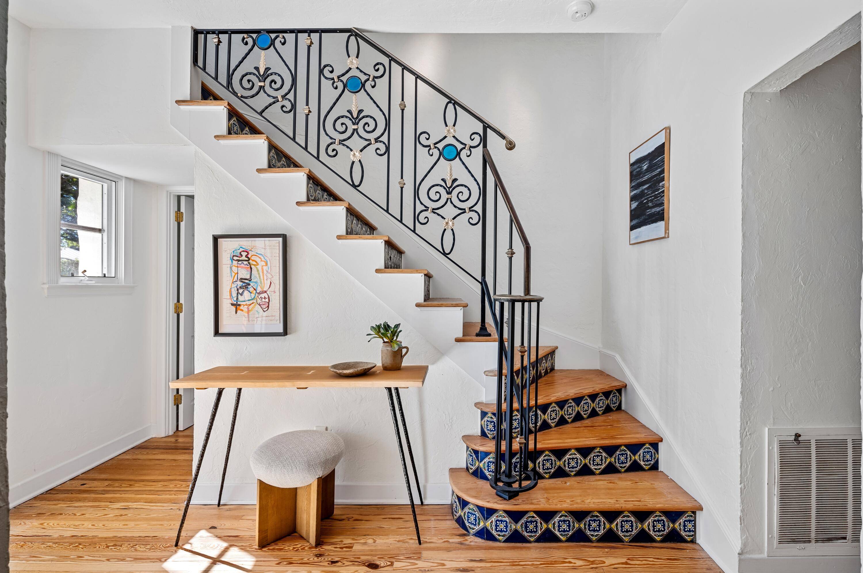 This light filled Spanish Colonial residence circa 1927 incorporates many elements representative of Mizner's style and time authentic barrel tile roof, iron wrapped front door, sprung arch windows, pecky cypress ...
