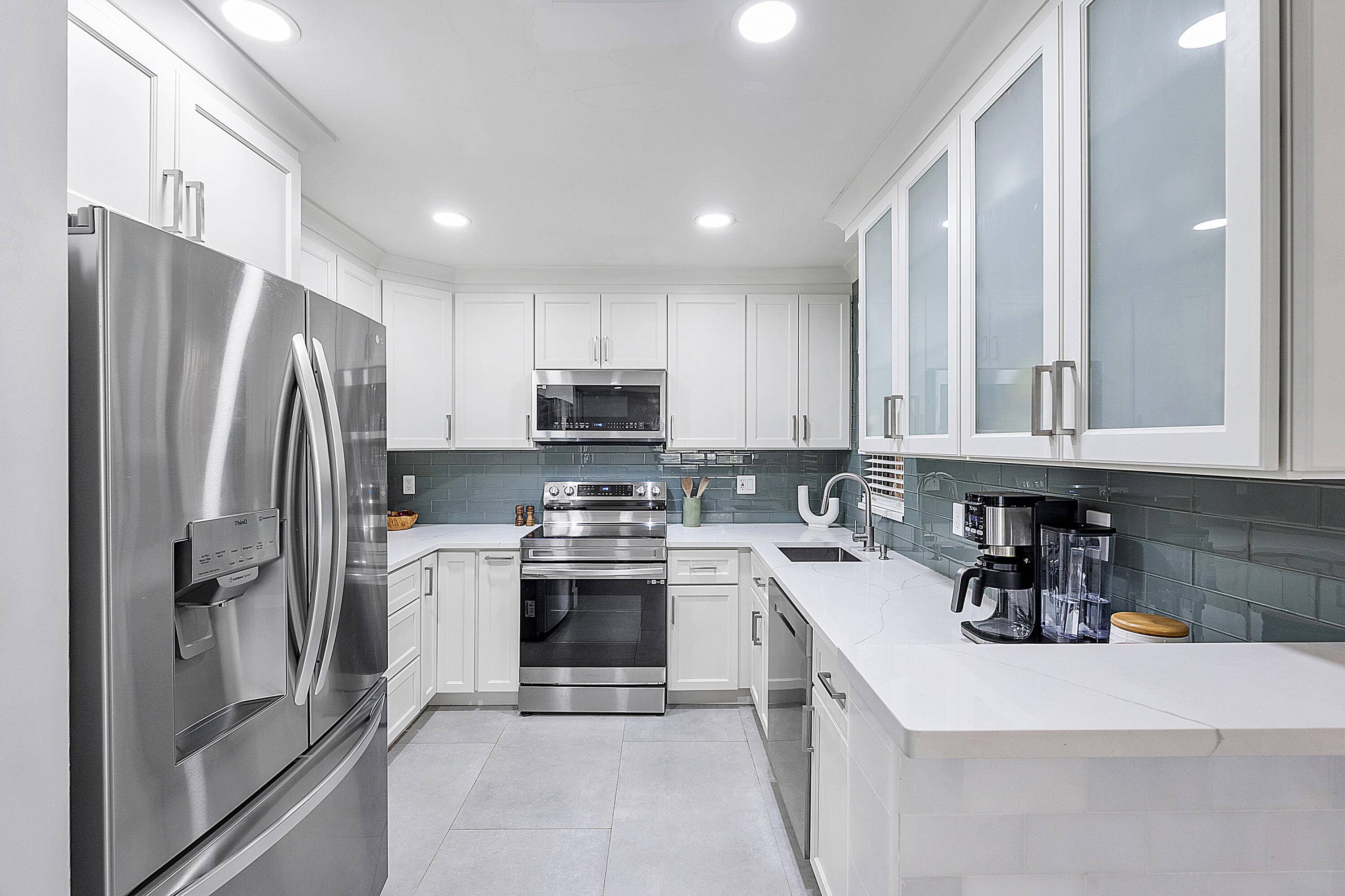 Welcome to this updated 3 2 first floor unit in the desirable Karanda Village community of Coconut Creek.
