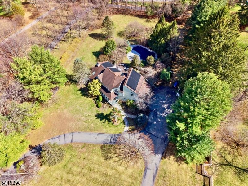 Set behind a long, private approach and surrounded by mature trees, this 4 bedroom, 4 bath residence offers a rare sense of seclusion, space, and light in one of Boonton ...