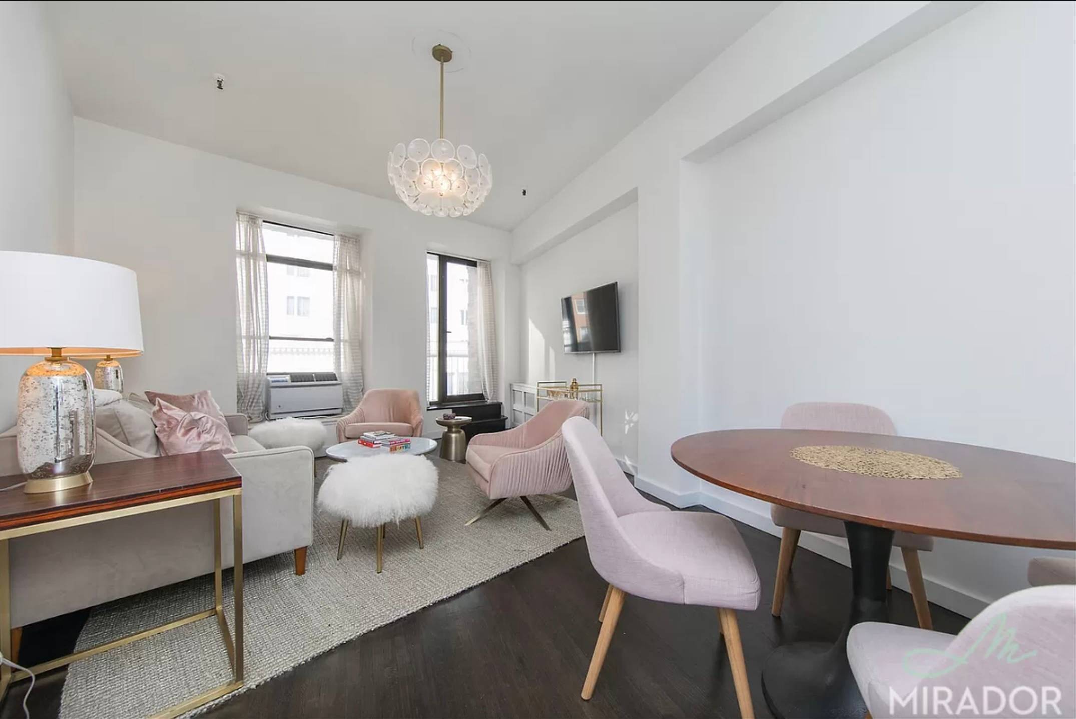 Fabulous 4th floor True North one bedroom with extra high ceilings, great natural light, a king sized bedroom, and balcony.