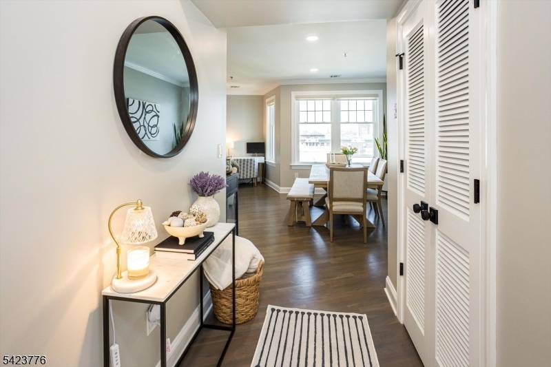 Experience elevated living in this bright and airy penthouse unit featuring generous living space, and abundant natural light.