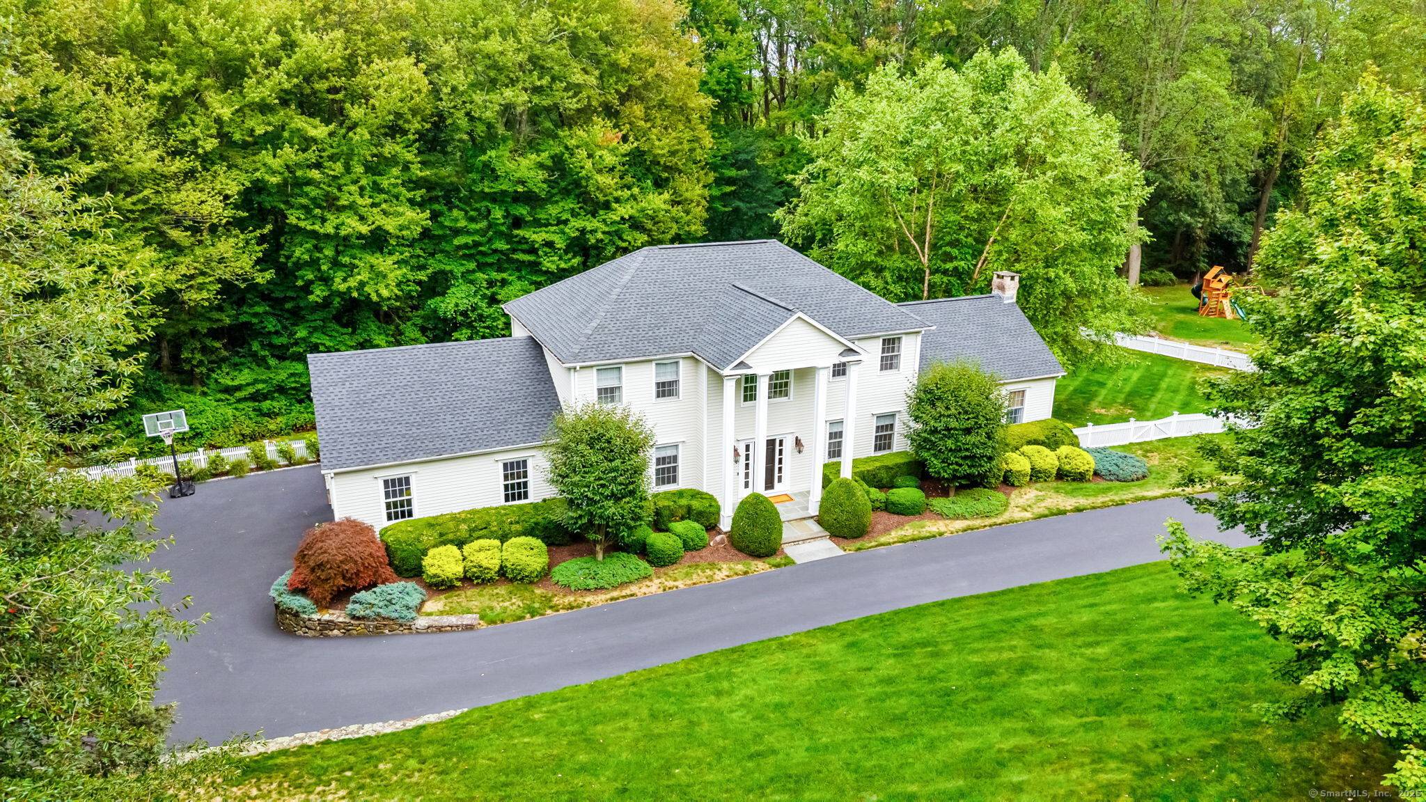 Welcome to this beautifully updated 4 bedroom Colonial in a sought after Greenfield Hill neighborhood, surrounded by rolling lawns and tree lined streets.