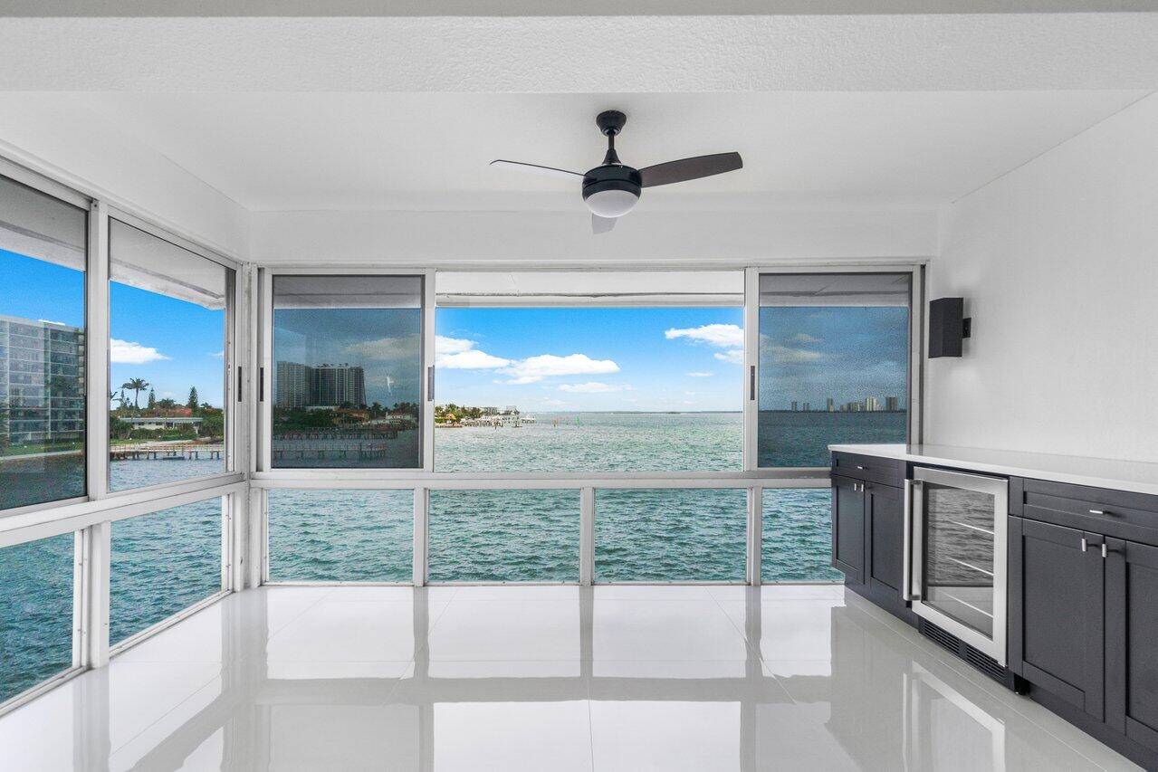Welcome to this exquisitely renovated 2 bedroom, 2 bathroom condo located directly on the intracoastal, offering stunning, unobstructed water views.