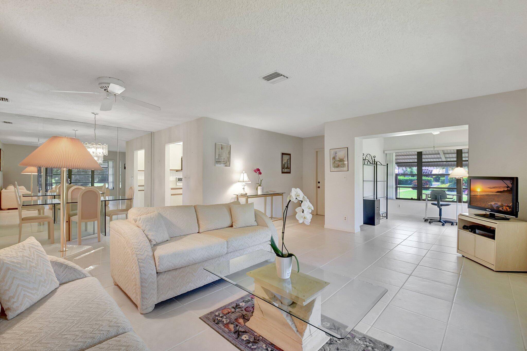 Charming 2BR 2BA corner villa nestled in the desirable 55 community of High Point.