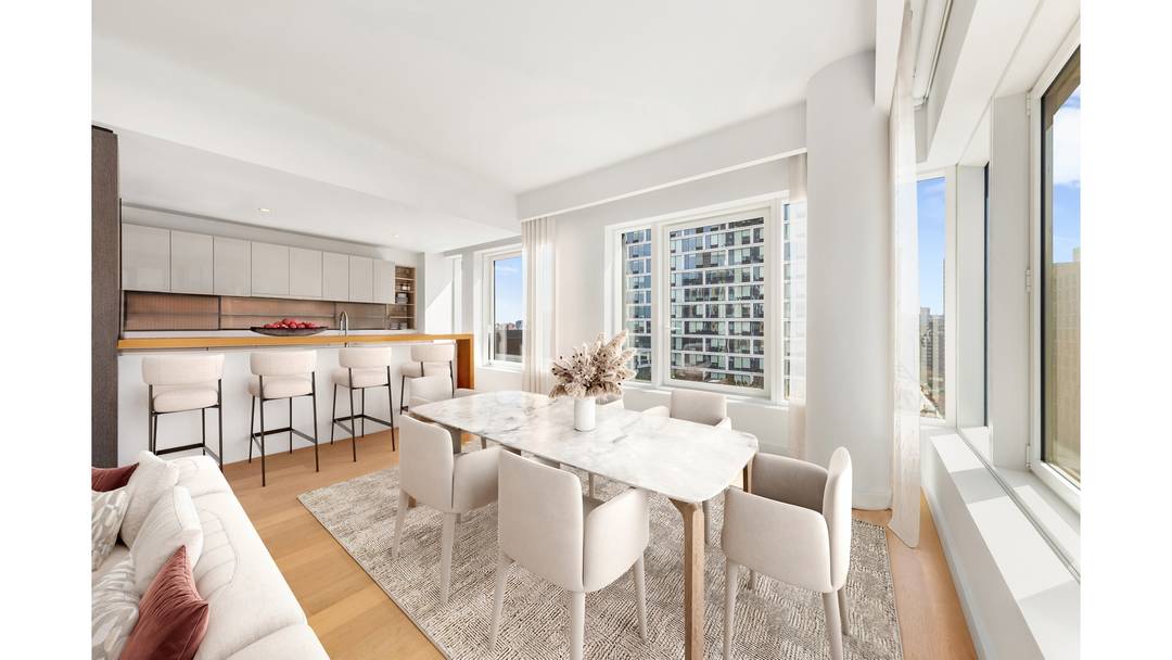 Residence 9M at One Essex Crossing is a rare duplex that pairs refined interiors with an exceptional scale of private outdoor living.