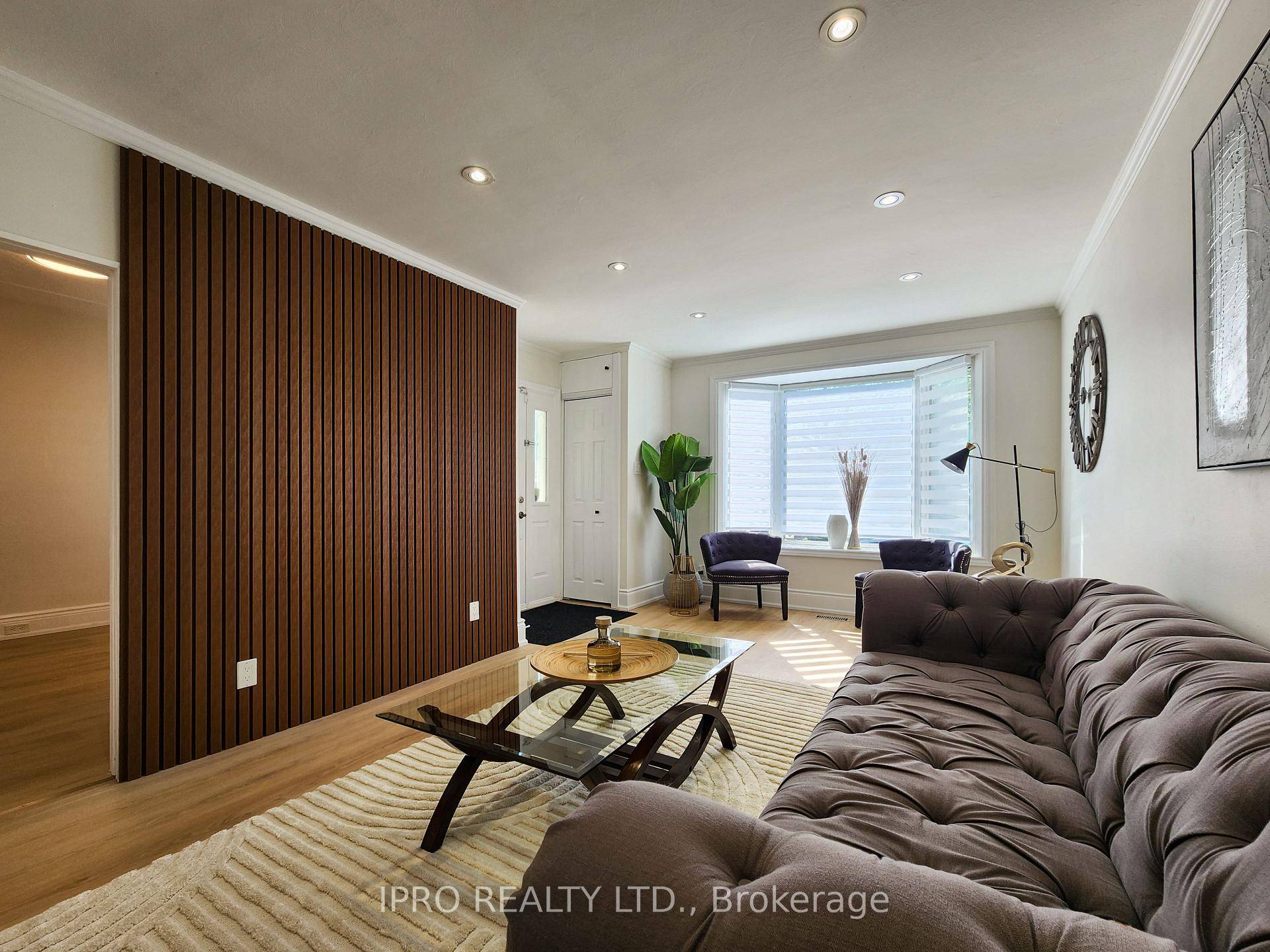 Step into this beautifully renovated detached bungalow where modern elegance meets cozy charm.