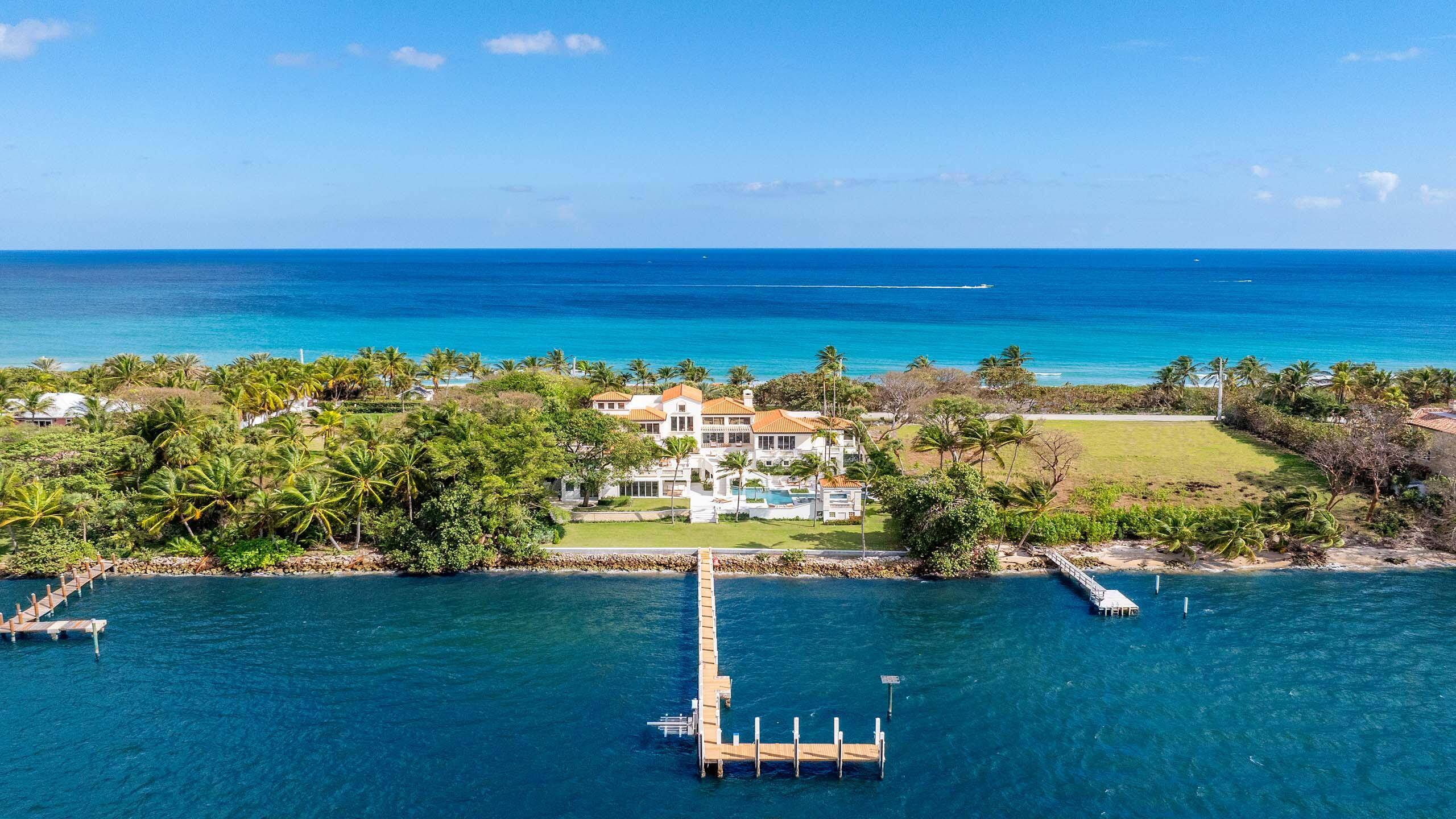 Recently updated, this stunning Ocean to Intracoastal Manalapan compound with beach house is situated on almost two acres with 150 feet of direct ocean and Intracoastal Waterway frontage.