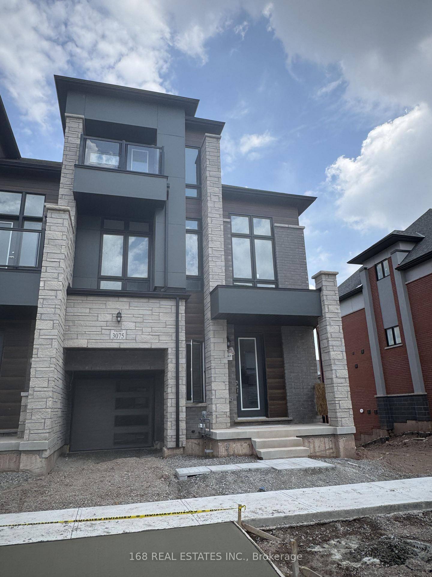 Introducing a newly built, luxurious 4 bedroom, 5 bathroom end unit townhouse in the highly desirable Joshua Meadows community.