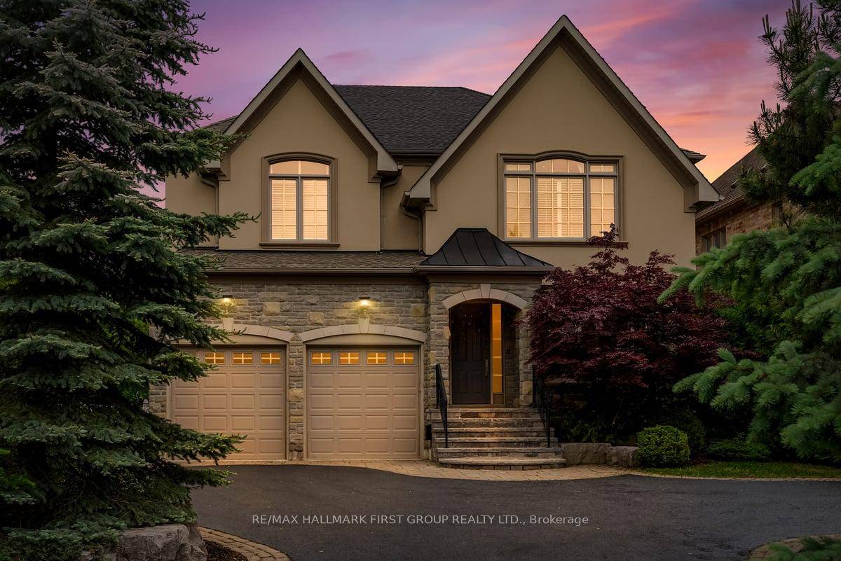 Welcome to this spectacular custom executive home, nestled on a RARE 374FT DEEP PREMIUM LOT offering ultimate privacy and serenity.