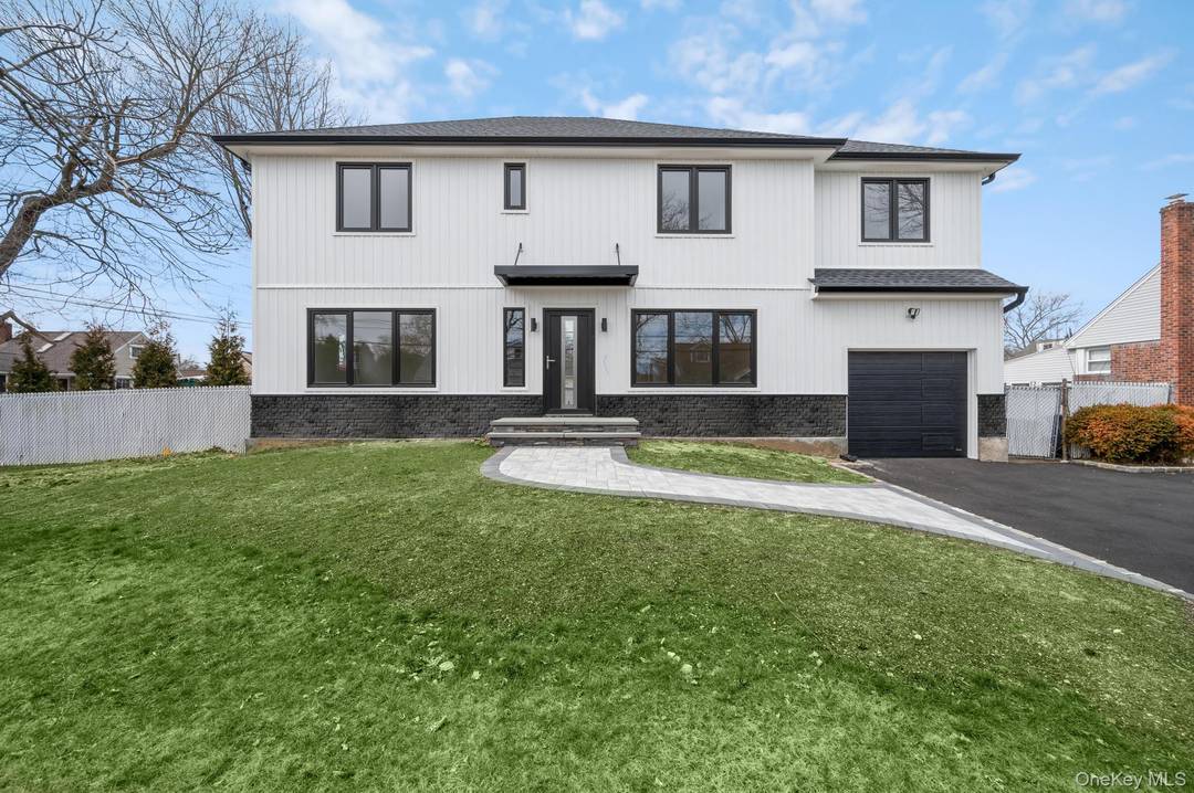 This stunning home in the desired Elwood School District completely remodeled in 2023 inside and out with premium finishes, quality updates, and magnificent workmanship.