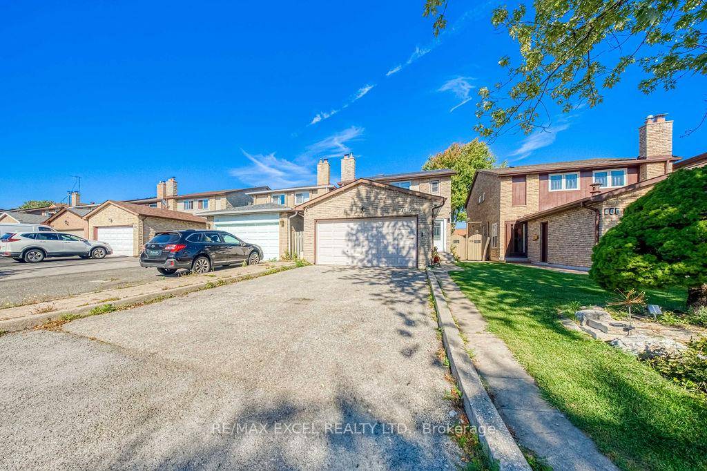 Beautifully renovated home in the highly sought after Milliken Mills West community !