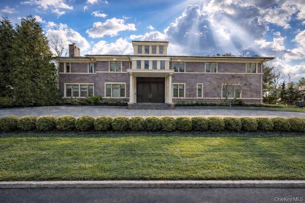 Welcome to this custom built 7, 719 sq ft Colonial that sits on a 34, 848 sq ft lot and offers exceptional space and craftsmanship.