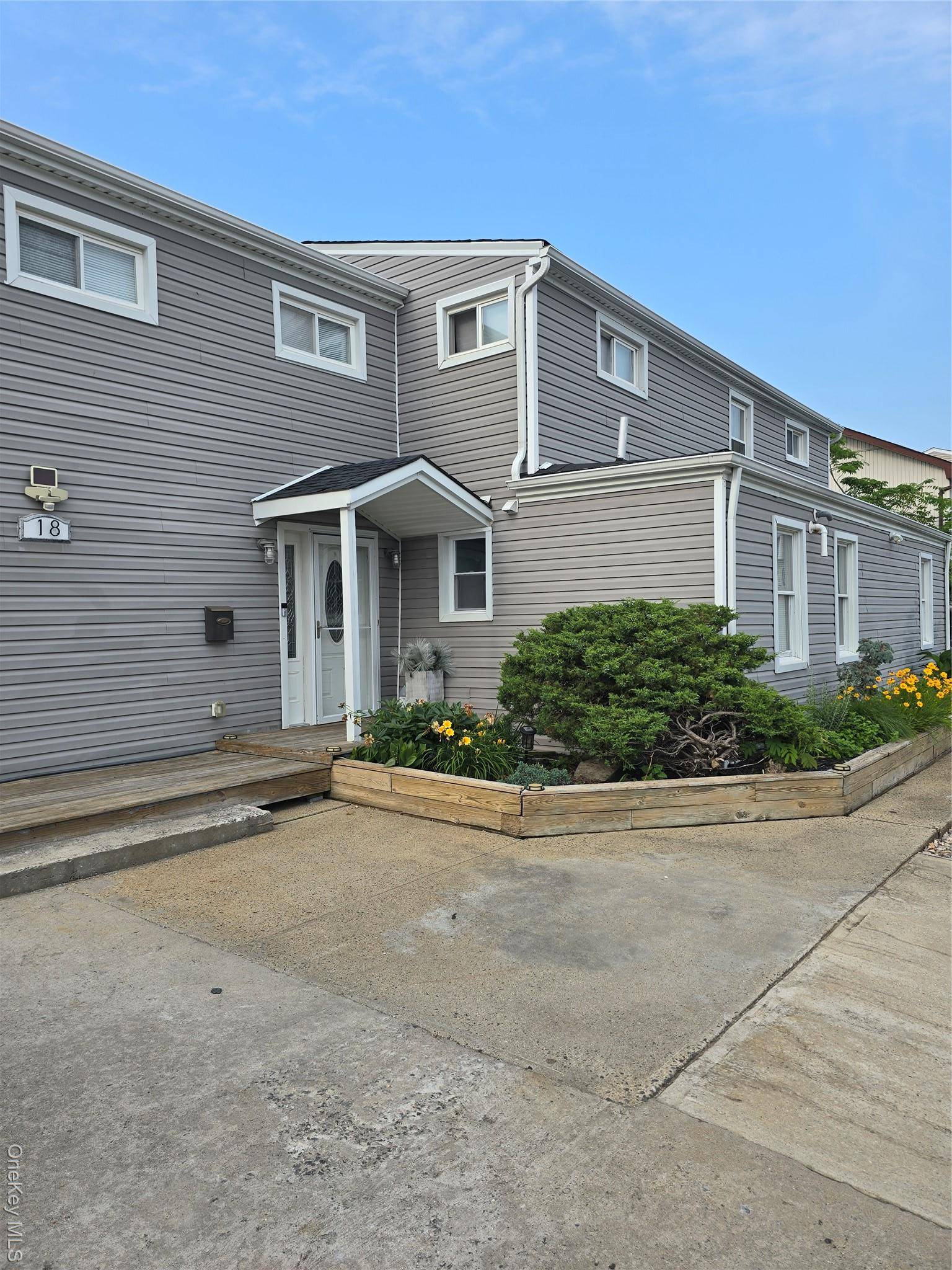 This duplex apartment is situated within a legal two family home and offers a spacious and inviting living environment, perfect for families or professionals seeking modern comfort.